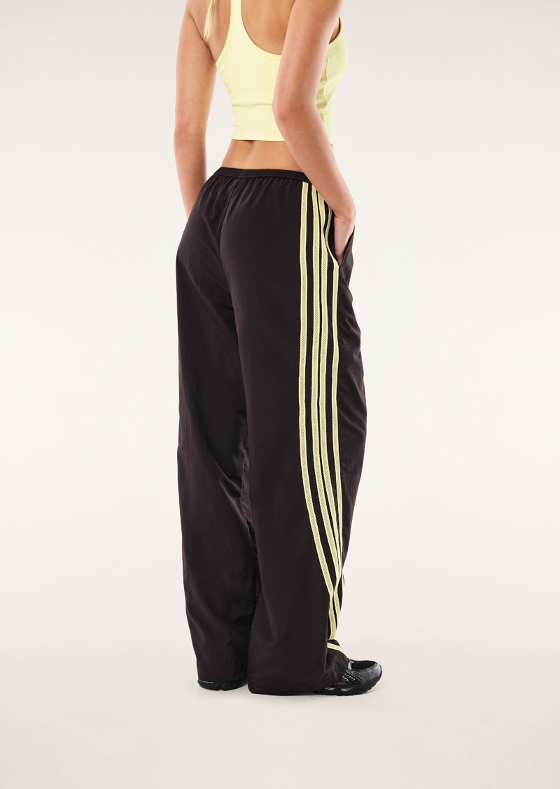 RADIUS PANT IN BLACK BEAN AND SOFT YELLOW BY P.E NATION, WOMEN'S TRACKPANT