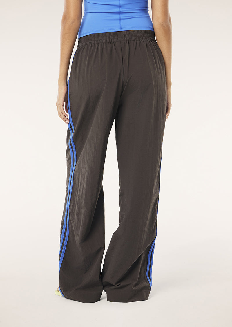 RELAY SPRAY TRACK PANT IN COFFEE BY P.E NATION WOMENS TRACK PANT