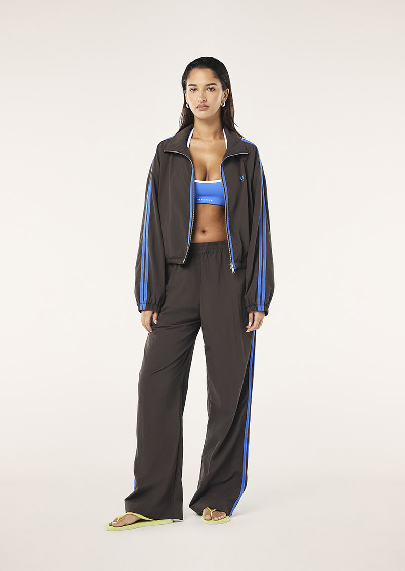 RELAY SPRAY TRACK PANT IN COFFEE BY P.E NATION WOMENS TRACK PANT