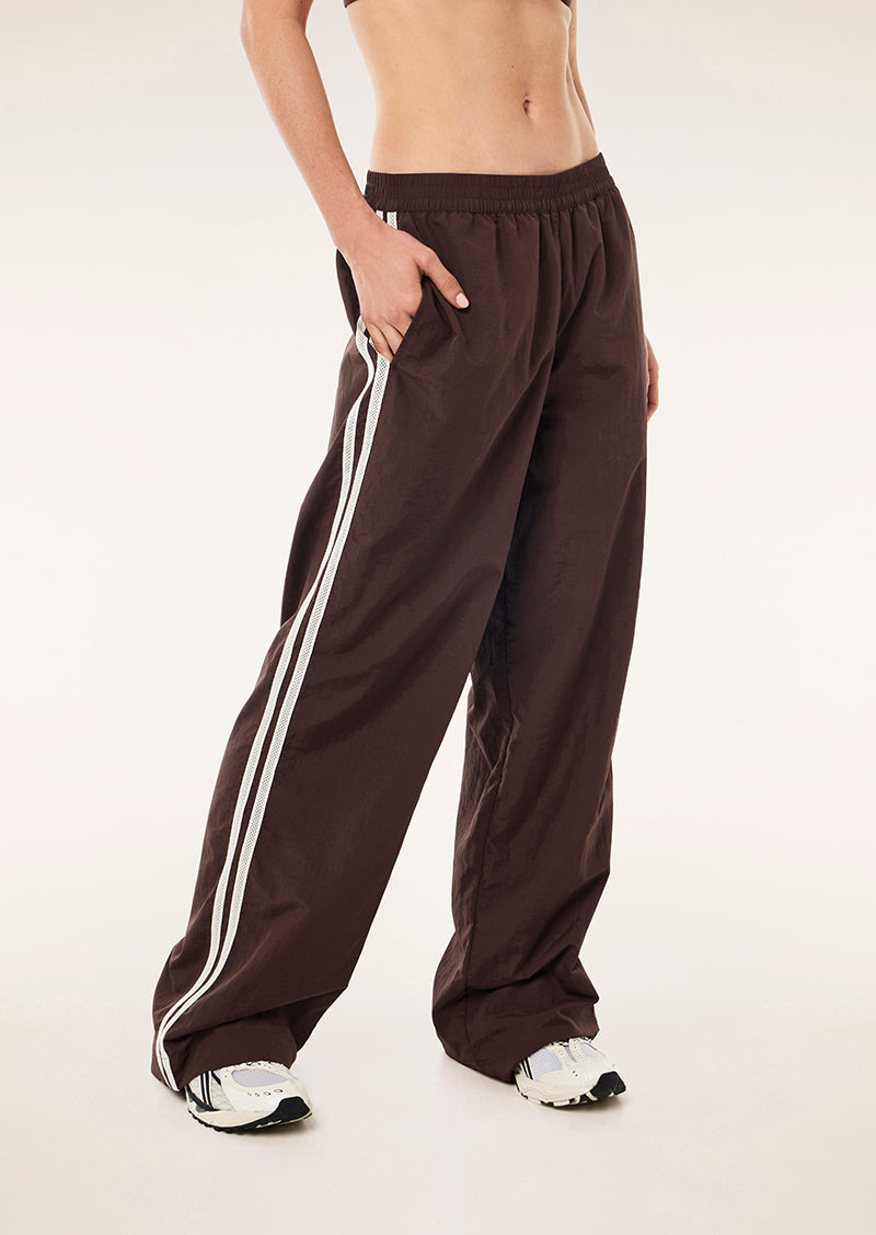RELAY SPRAY TRACK PANT IN MAHOGANY