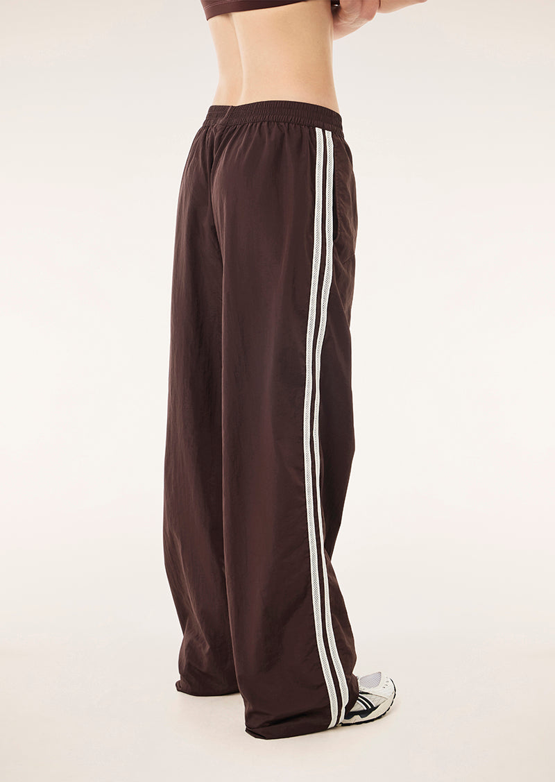 RELAY SPRAY TRACK PANT IN MAHOGANY