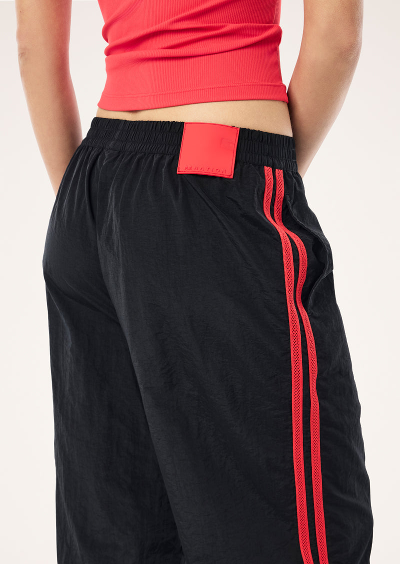RELAY+SPRAY+TRACK+PANT_254P254_BLACK+STRAWBERRY-29_1
