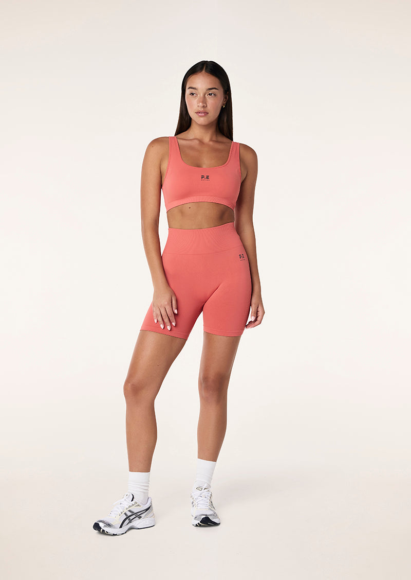 RESTORE SEAMLESS 5" BIKE SHORT IN BRICK RED