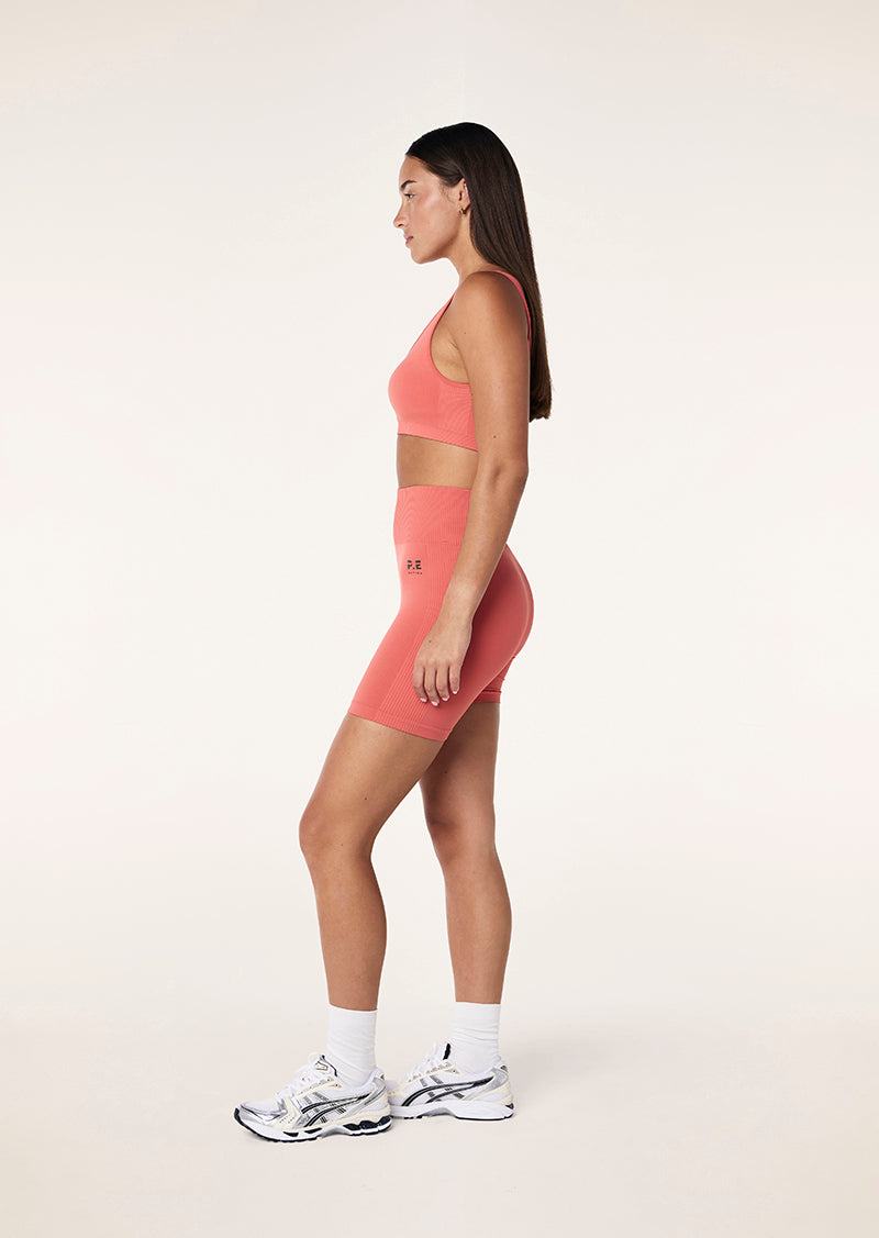 RESTORE SEAMLESS 5" BIKE SHORT IN BRICK RED