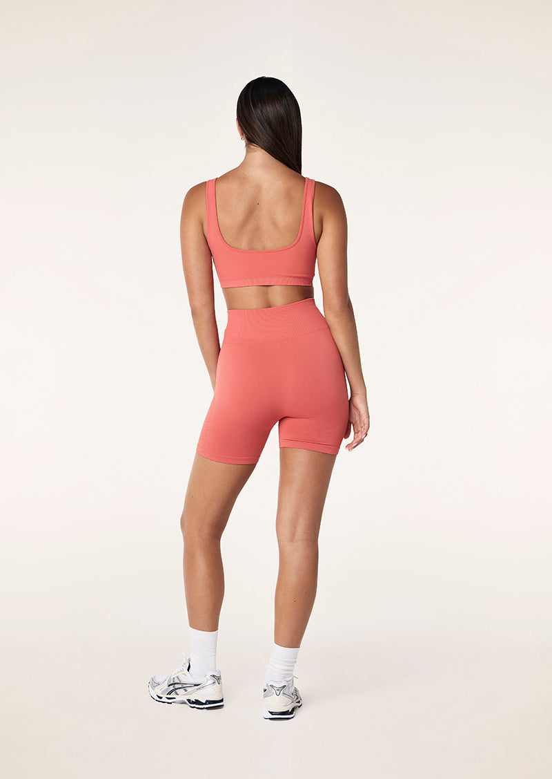 RESTORE SEAMLESS 5" BIKE SHORT IN BRICK RED