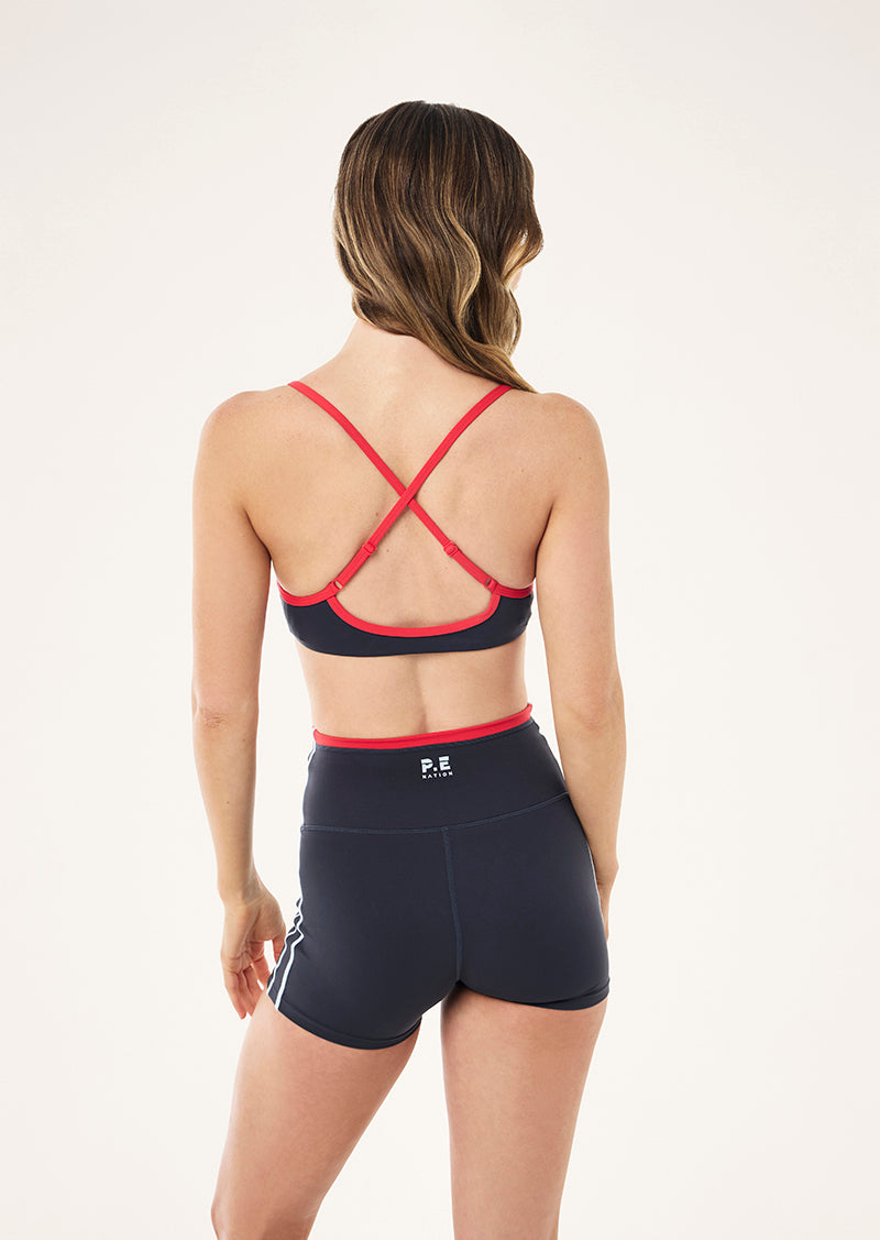 REVEAL SPORTS BRA IN MARINE BLUE