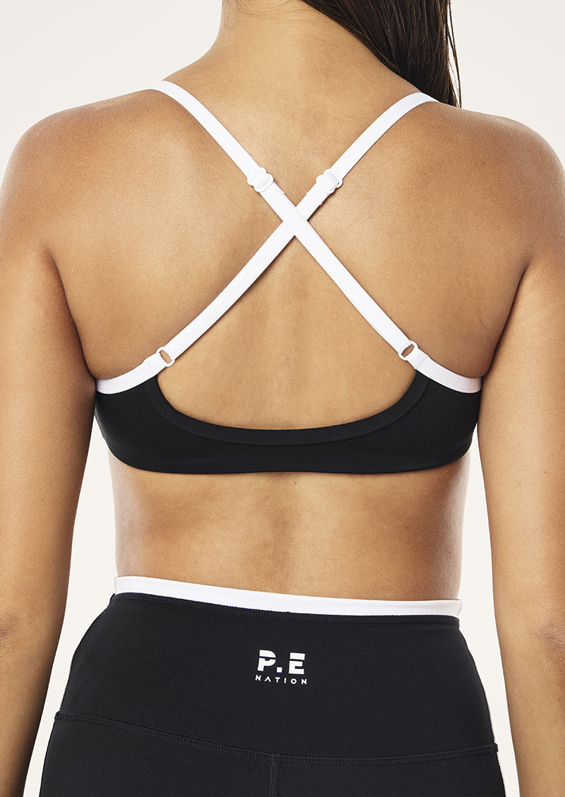 REVEAL SPORTS BRA IN BLACK BY P.E NATION