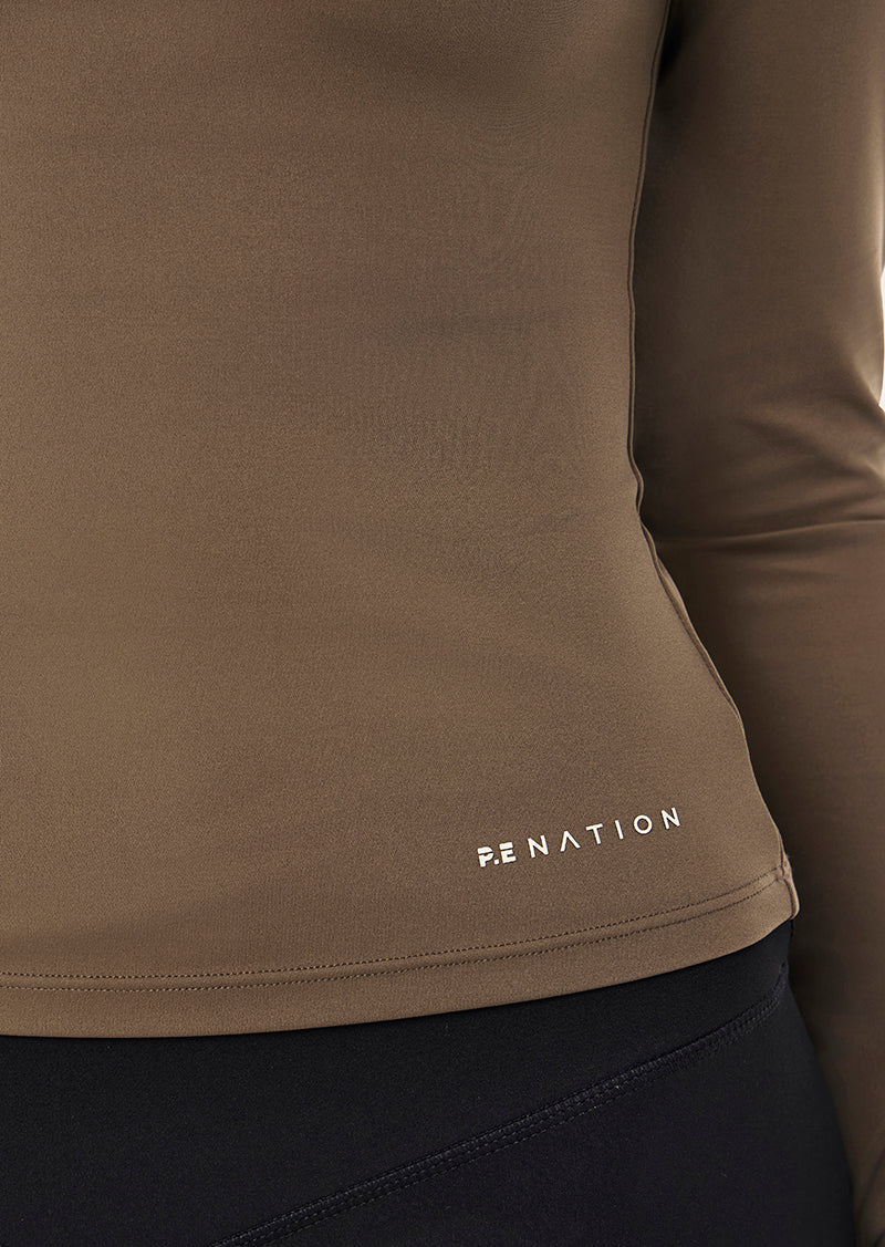 ROUTINE QUARTER ZIP LONG SLEEVE TOP IN WALNUT BY P.E NATION, WOMENS ATHLEISURE LONG SLEEVE TOP BROWN
