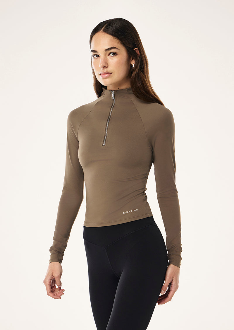 ROUTINE QUARTER ZIP LONG SLEEVE TOP IN WALNUT BY P.E NATION, WOMENS ATHLEISURE LONG SLEEVE TOP BROWN
