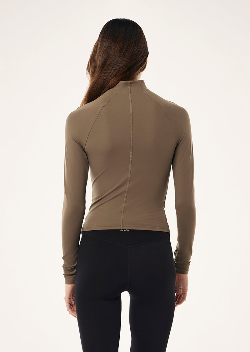 ROUTINE QUARTER ZIP LONG SLEEVE TOP IN WALNUT BY P.E NATION, WOMENS ATHLEISURE LONG SLEEVE TOP BROWN