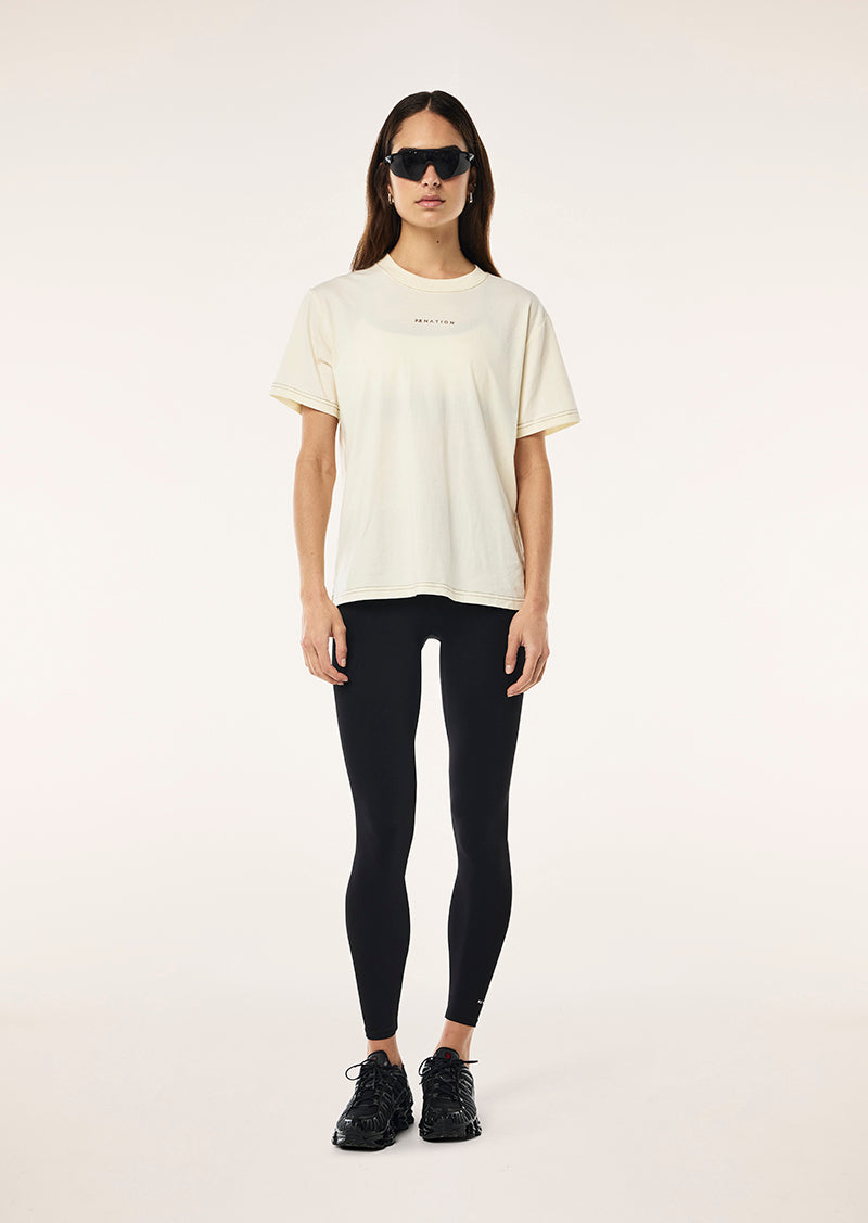SHIFT TEE IN WHISPER WHITE BY P.E NATION, WOMENS ATHLEISURE GRAPHIC TEE CREAM