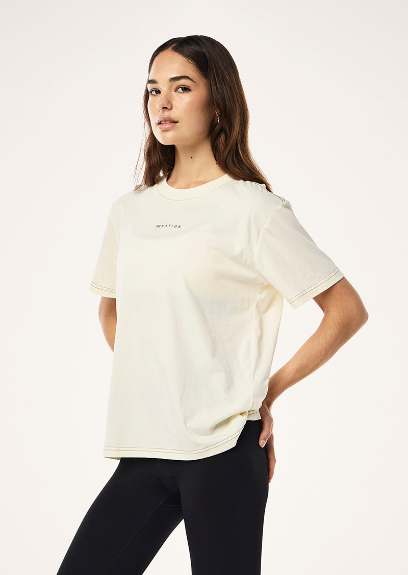 SHIFT TEE IN WHISPER WHITE BY P.E NATION, WOMENS ATHLEISURE GRAPHIC TEE CREAM