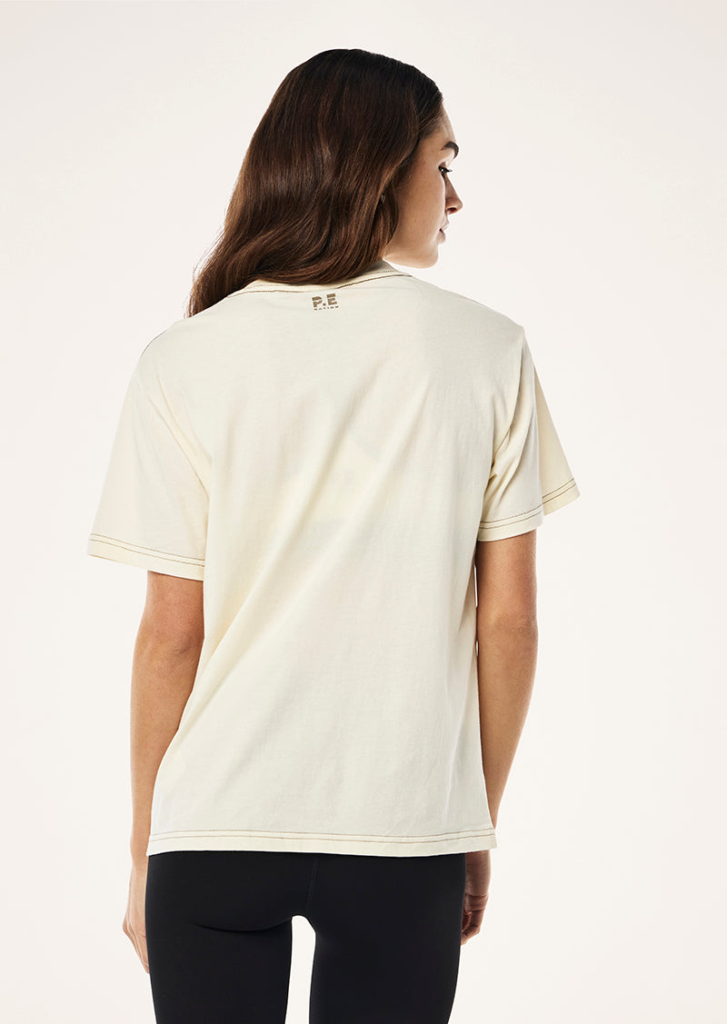 SHIFT TEE IN WHISPER WHITE BY P.E NATION, WOMENS ATHLEISURE GRAPHIC TEE CREAM