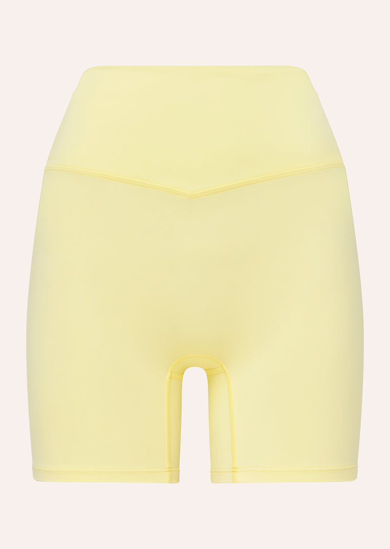SIGNATURE 5 INCH BIKE SHORT IN SOFT YELLOW BY P.E NATION, WOMEN'S PILATES BIKE SHORT