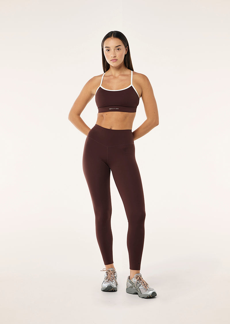 SIGNATURE SPORTS BRA IN MAHOGANY BY P.E NATION WOMENS ATHLEISURE SPORTS BRA