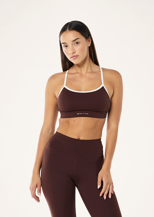 SIGNATURE SPORTS BRA IN MAHOGANY BY P.E NATION