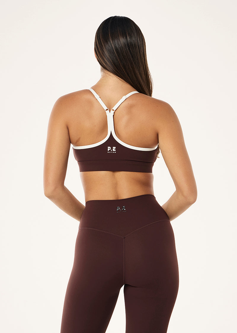 SIGNATURE SPORTS BRA IN MAHOGANY BY P.E NATION WOMENS ATHLEISURE SPORTS BRA