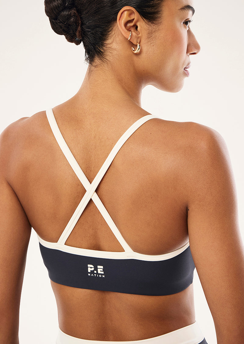 SPECTRUM SPORTS BRA IN MARINE BLUE & WHISPER WHITE BY P.E NATION, WOMEN'S ATHLEISURE SPORTS BRA