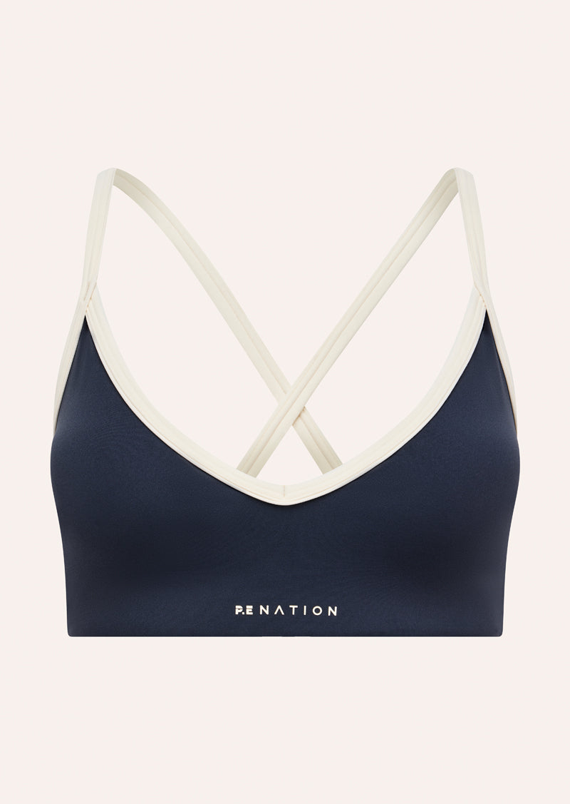 SPECTRUM SPORTS BRA IN MARINE BLUE & WHISPER WHITE BY P.E NATION, WOMEN'S ATHLEISURE SPORTS BRA