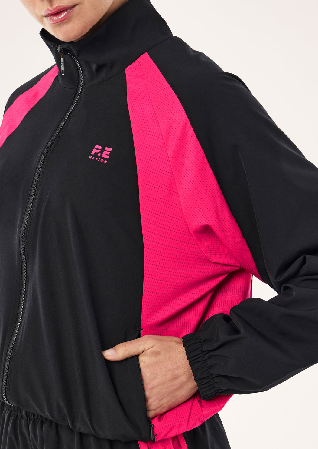 STRIDE+JACKET_263J055_BLACK-COSMO+PINK-037_1