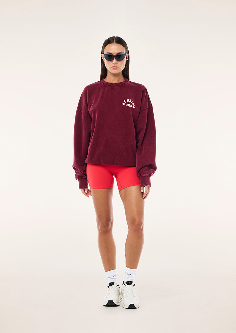 SWERVE SWEAT IN WASHED CABERNET BY P.E NATION, WOMEN'S ATHLEISURE SWEATSHIRT