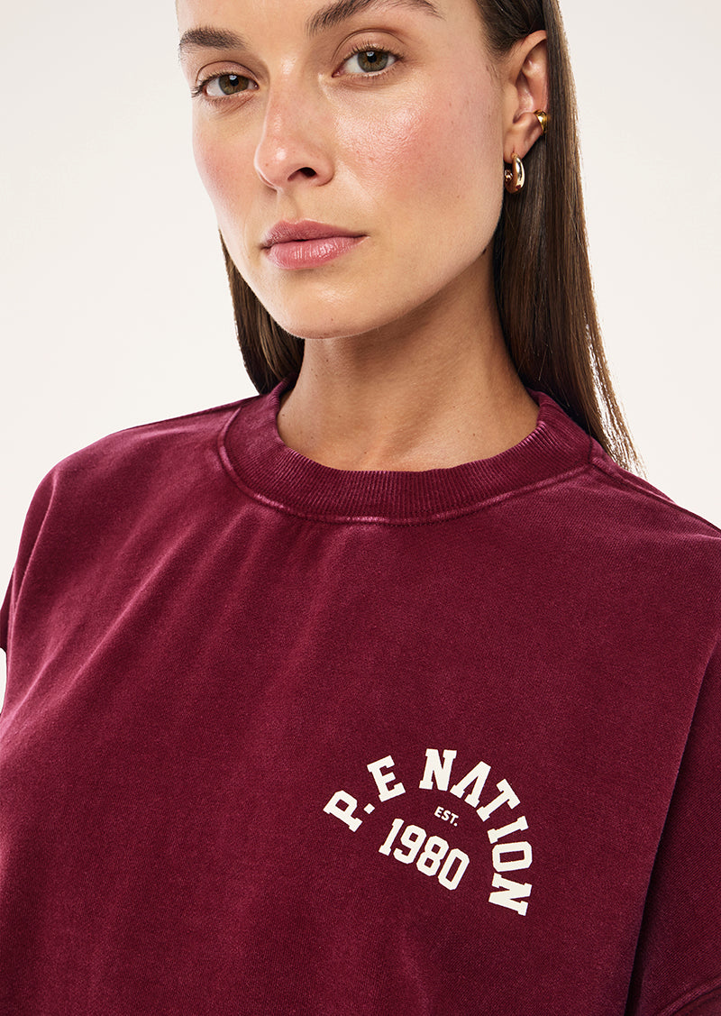 SWERVE SWEAT IN WASHED CABERNET BY P.E NATION, WOMEN'S ATHLEISURE SWEATSHIRT