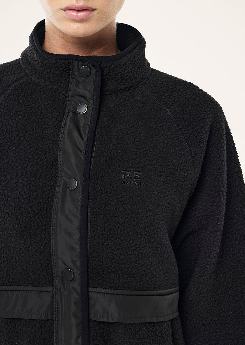 TECHNIQUE JACKET IN BLACK BY P.E NATION WOMENS ATHLEISURE JACKET