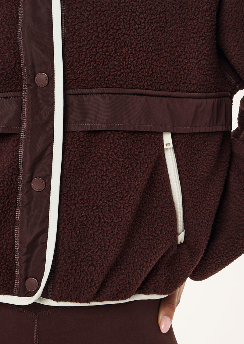 TECHNIQUE JACKET IN MAHOGANY BY P.E NATION WOMENS ATHLEISURE JACKET