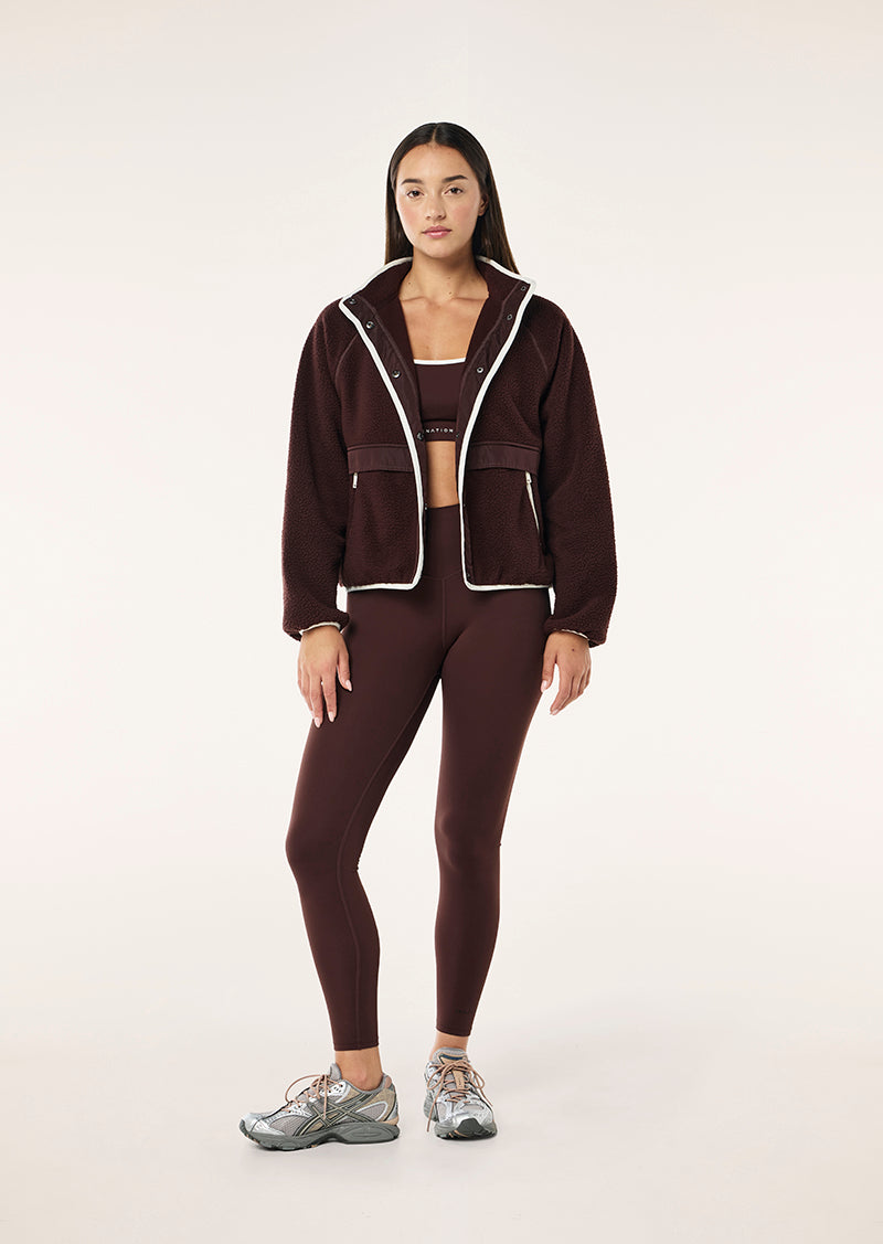 TECHNIQUE JACKET IN MAHOGANY BY P.E NATION WOMENS ATHLEISURE JACKET