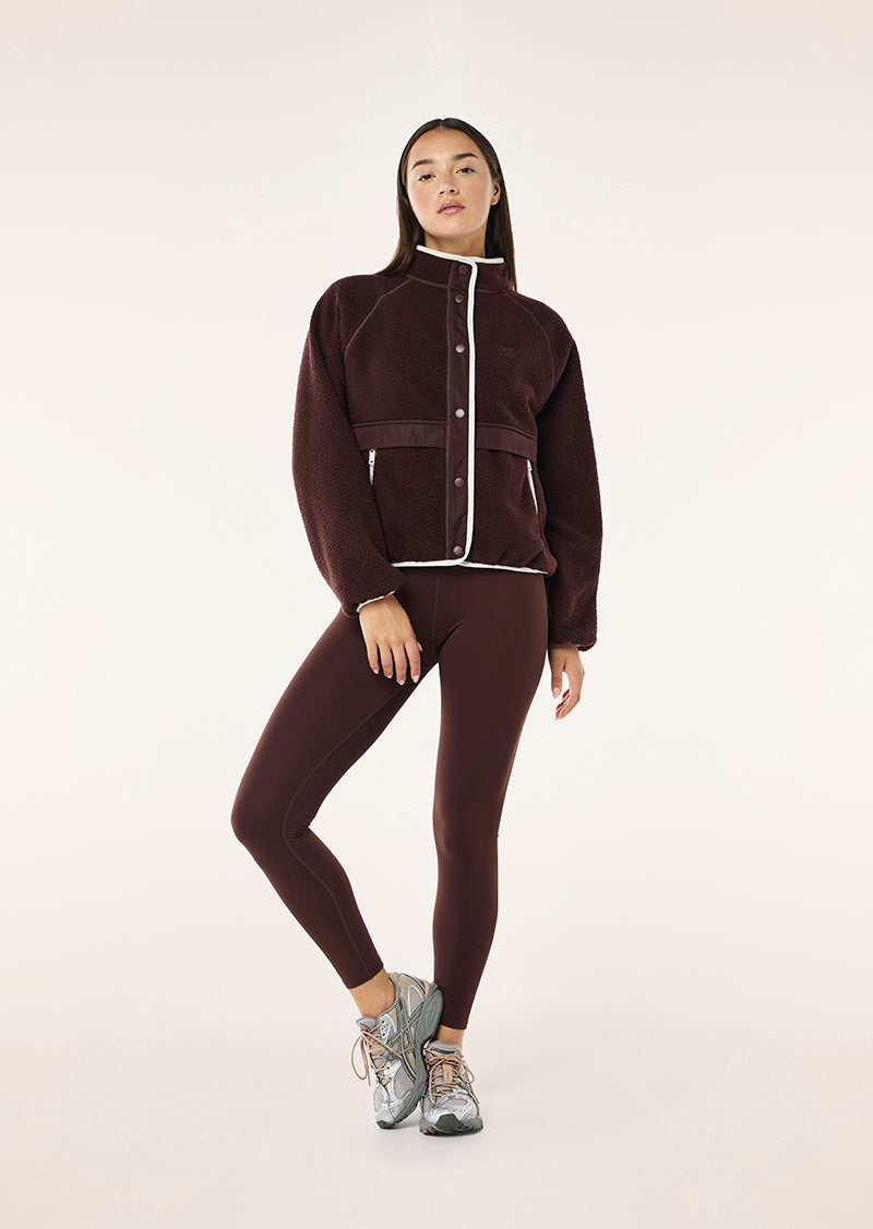TECHNIQUE JACKET IN MAHOGANY BY P.E NATION WOMENS ATHLEISURE JACKET
