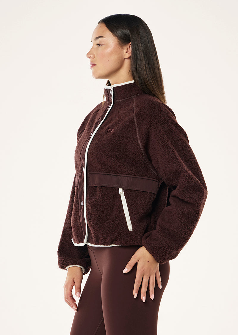 TECHNIQUE JACKET IN MAHOGANY BY P.E NATION WOMENS ATHLEISURE JACKET