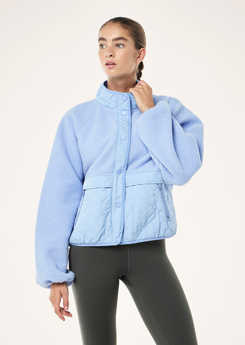 P.E NATION WOMENS TECHNIQUE QUILT JACKET IN DUSTY BLUE