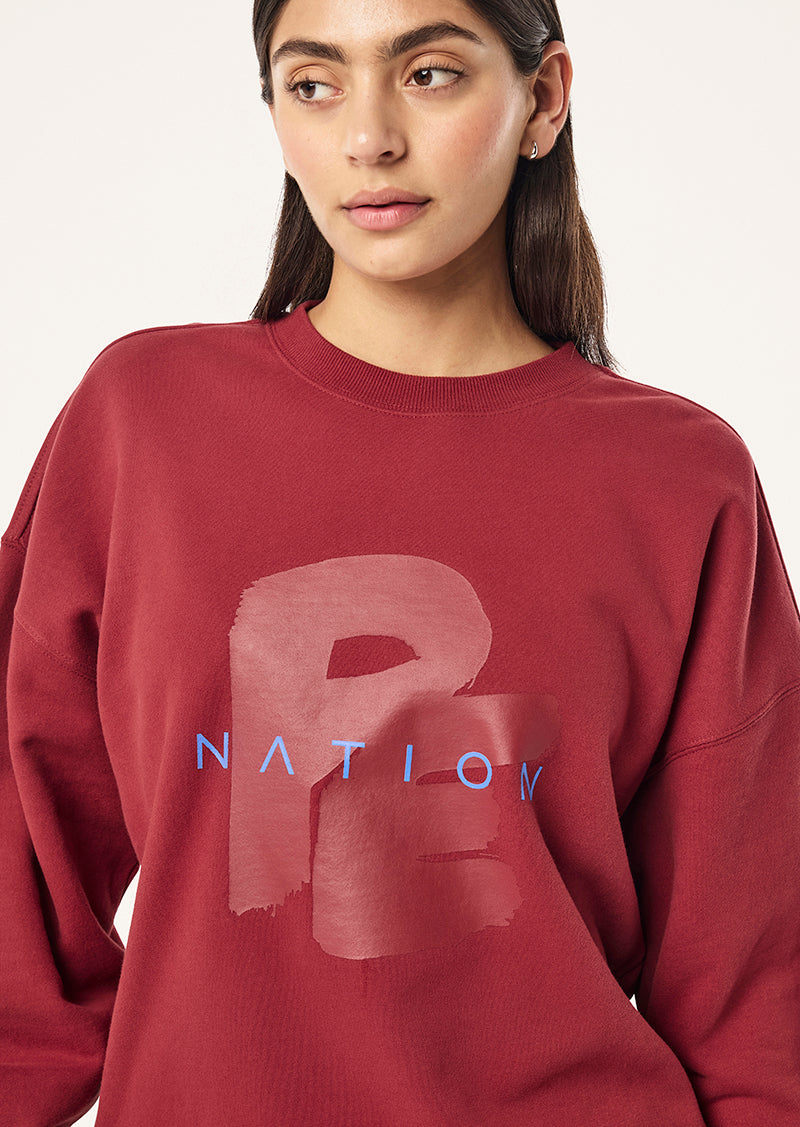 TIDAL OVERSIZED SWEAT IN CHERRY BY P.E NATION, WOMEN'S ATHLEISURE SWEAT
