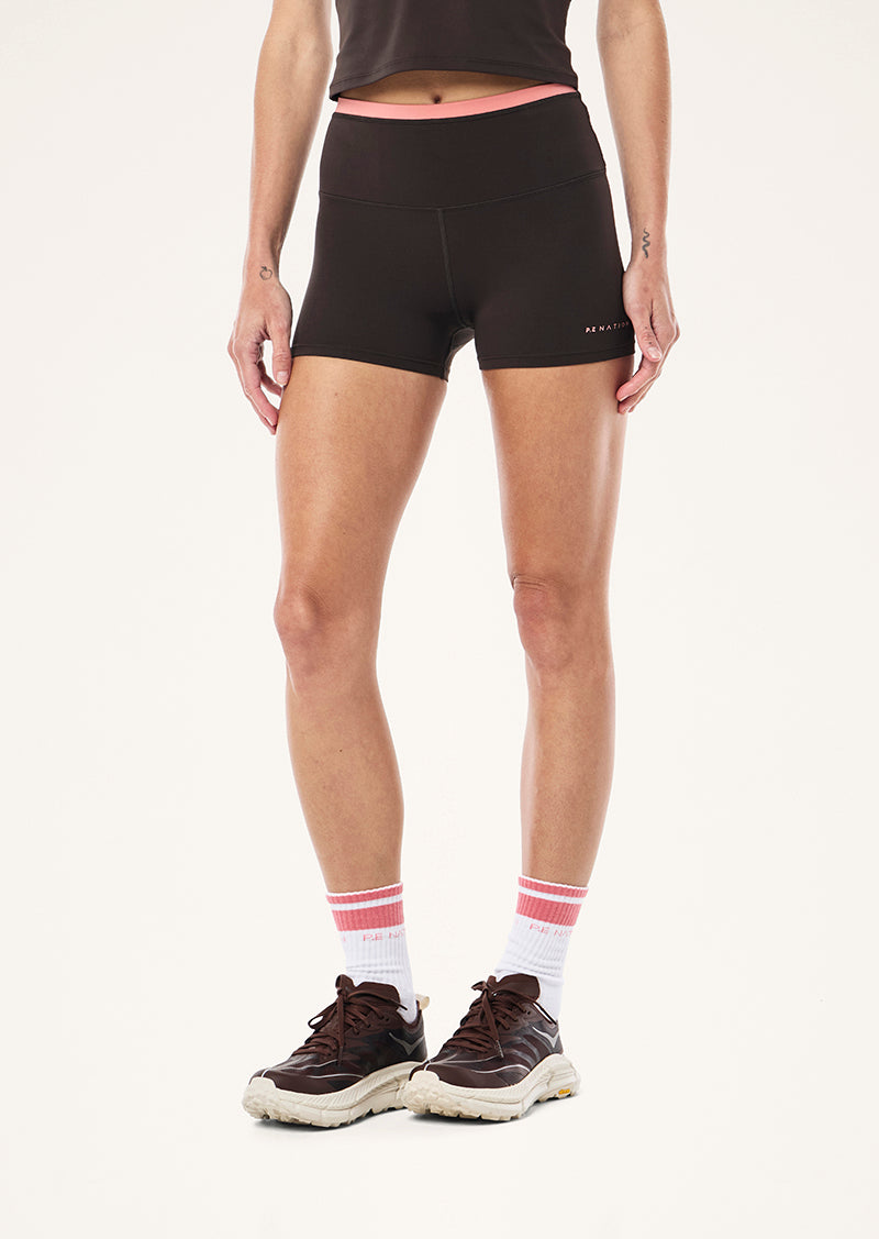 VITA 2 5 BIKE SHORT IN LICORICE AND DUSTY PINK BY P.E NATION WOMENS ATHLEISURE BIKE SHORT