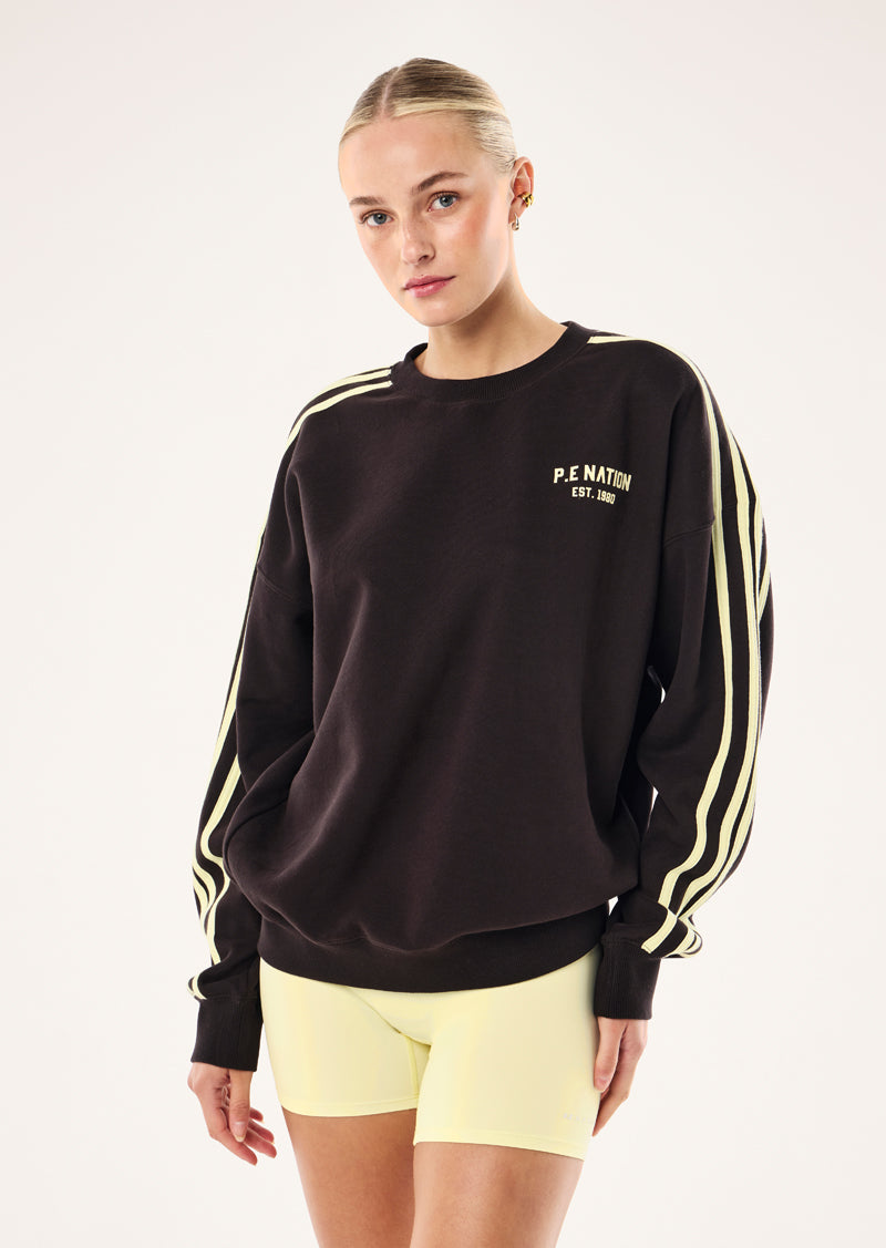VOLTAGE OVERSIZED SEAT IN BLACK BEAN BY P.E NATION, WOMEN'S ATHLEISURE SWEATSHIRT
