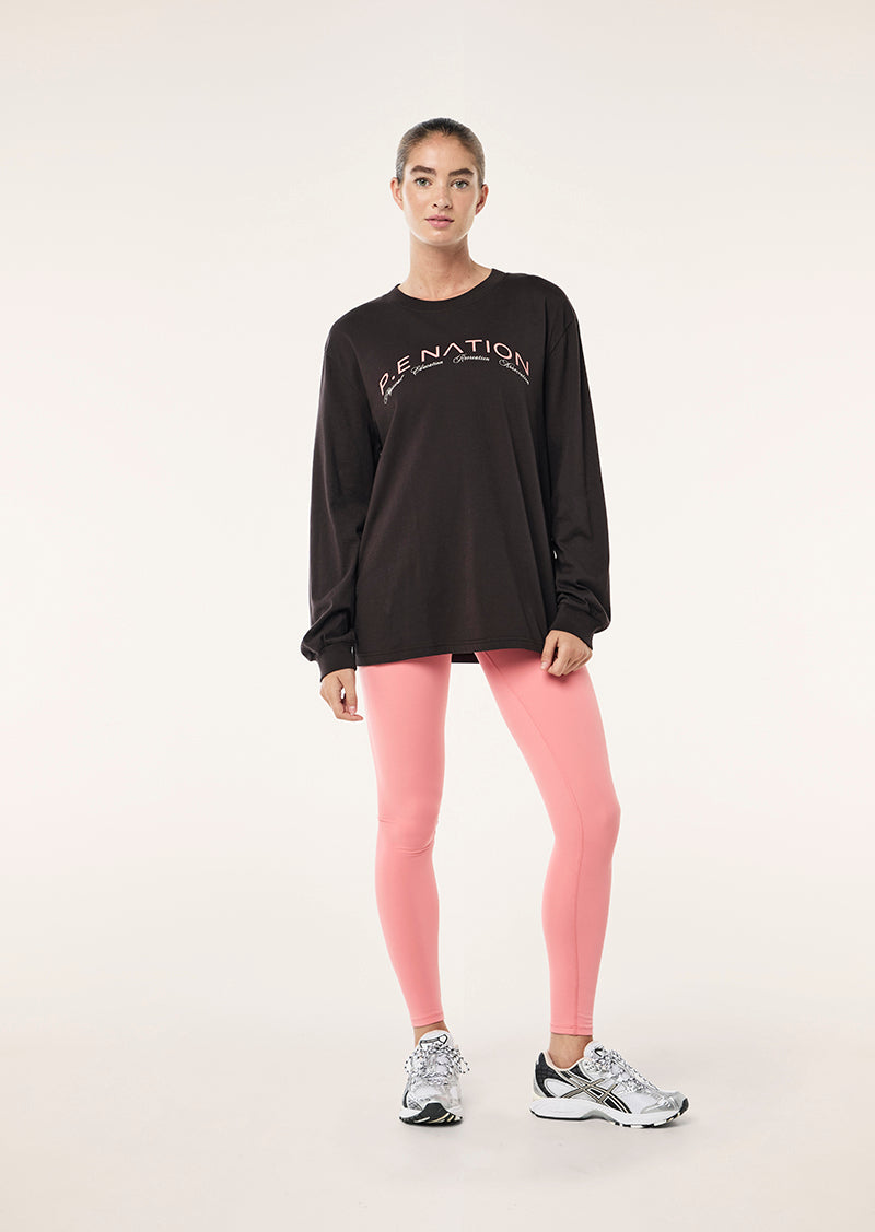 VOLUME LONG SLEEVE TEE IN LICORICE BY P.E NATION WOMENS ACTIVE TEE