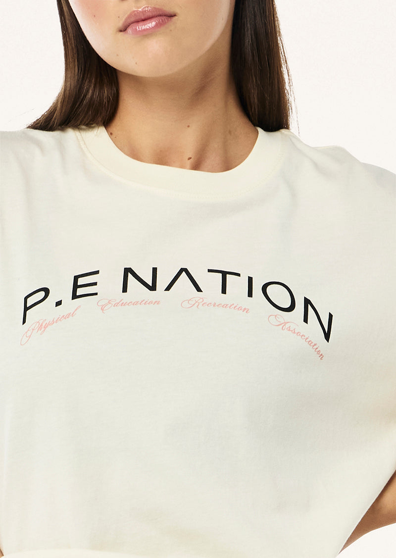 VOLUME TEE IN WHISPER WHITE BY P.E NATION WOMENS ACTIVE TEE TOP
