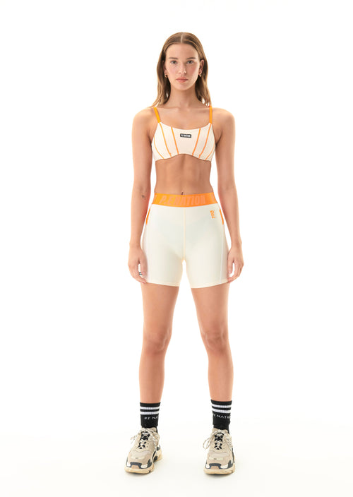FAIRWAY BIKE SHORT IN PEARLED IVORY