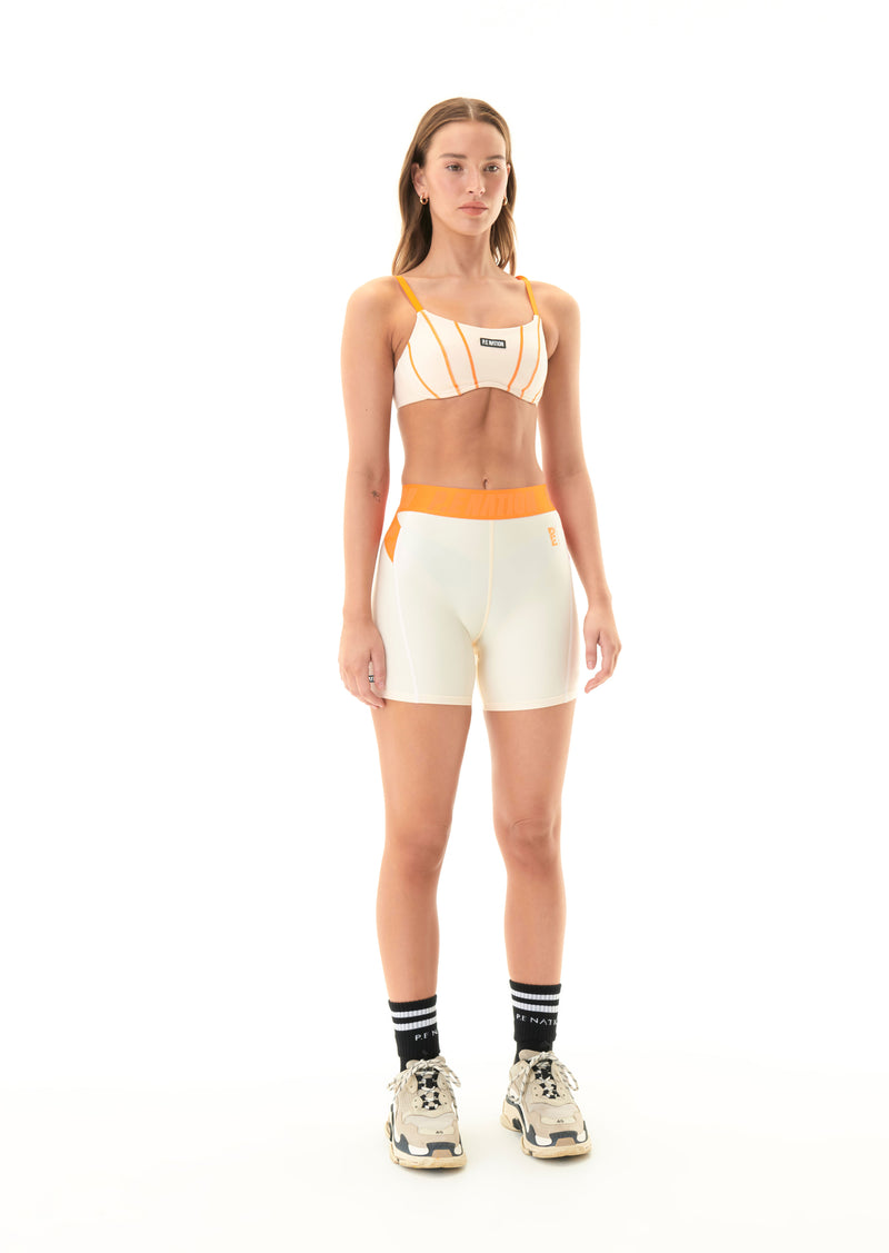 FAIRWAY BIKE SHORT IN PEARLED IVORY