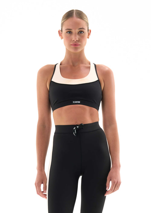 DEFENDING ZONE SPORTS BRA IN BLACK