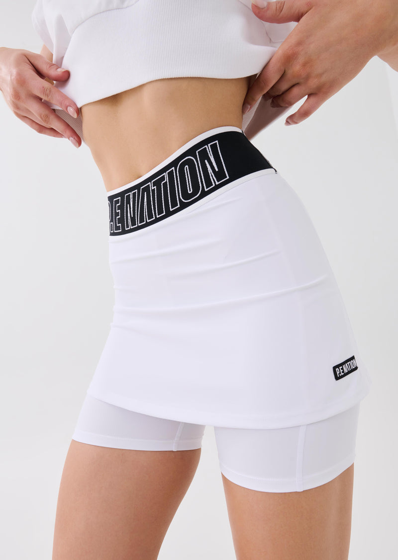 FOLLOW THROUGH SKORT IN OPTIC WHITE
