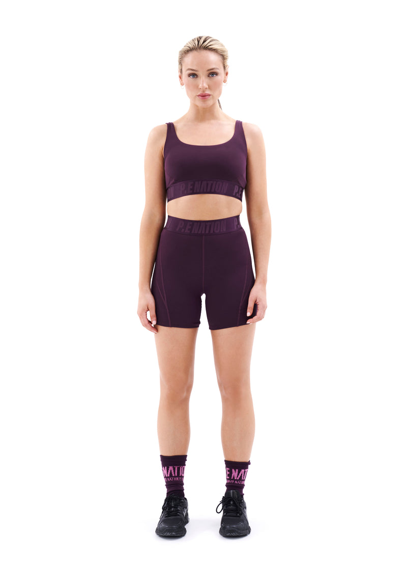 BACKCHECK BIKE SHORT IN POTENT PURPLE