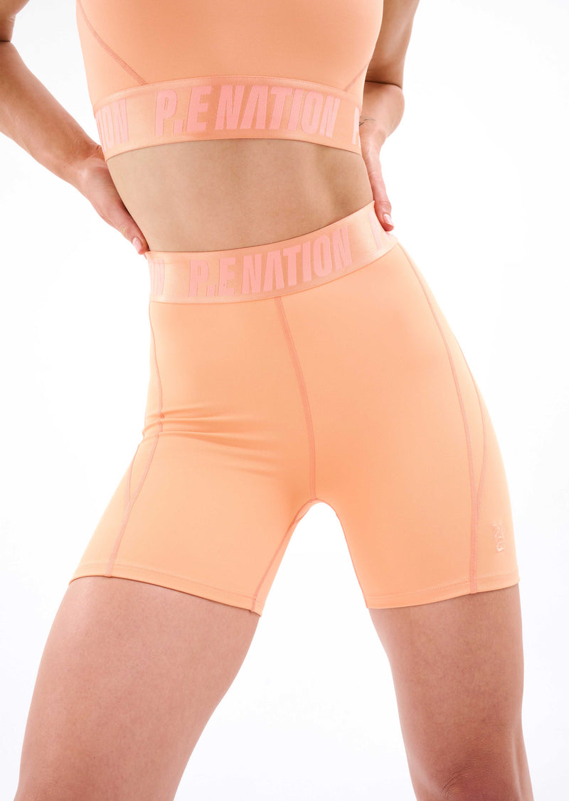 BACKCHECK BIKE SHORT IN CANTALOUPE