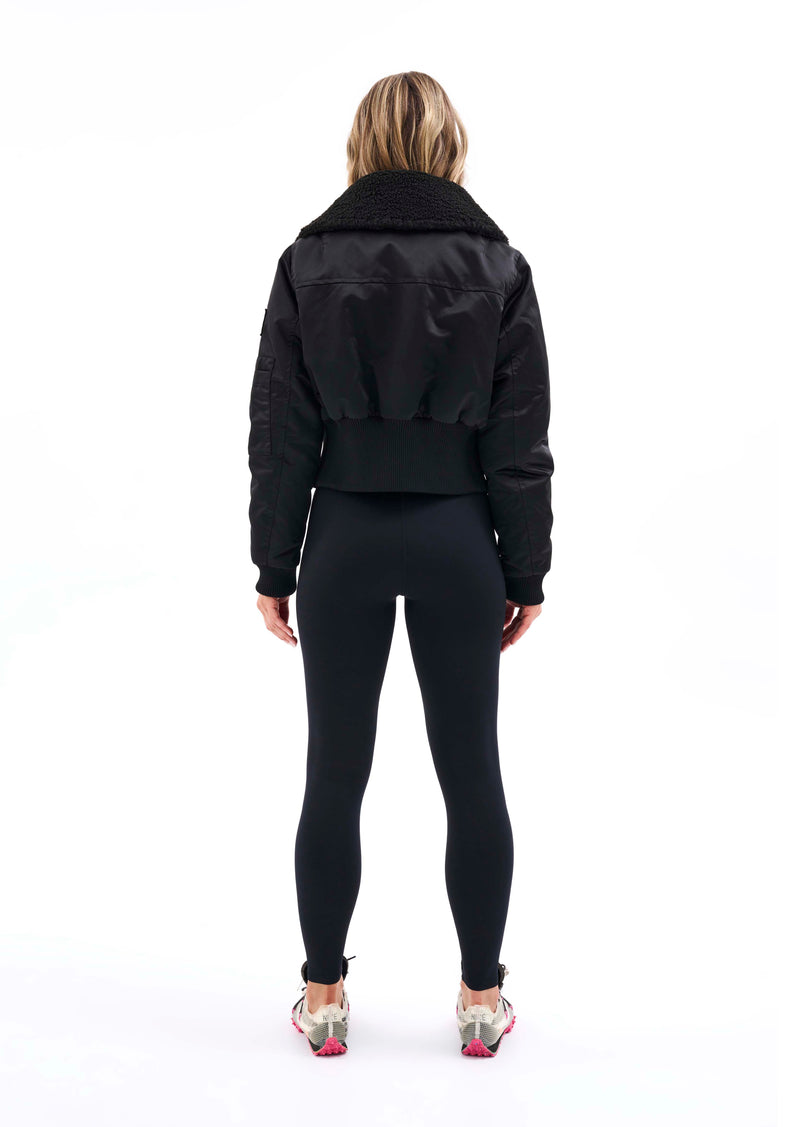 TWIST SERVE JACKET IN BLACK