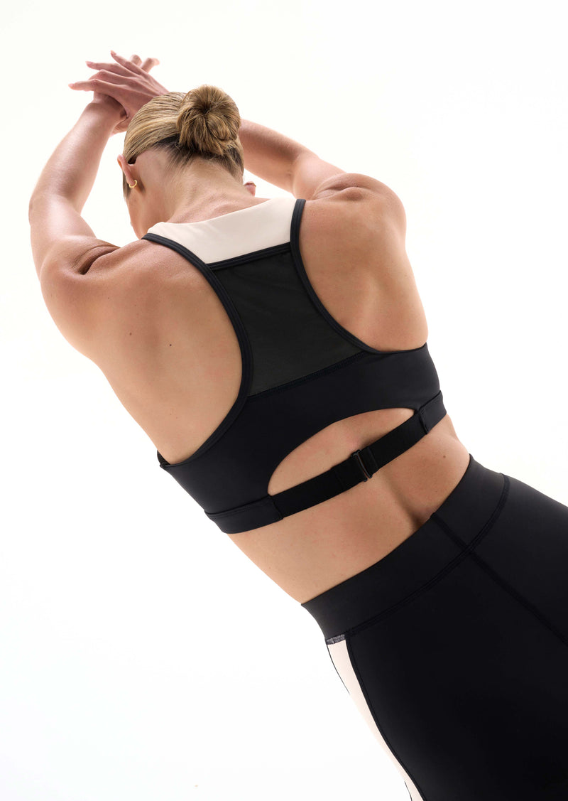 DEFENDING ZONE SPORTS BRA IN BLACK