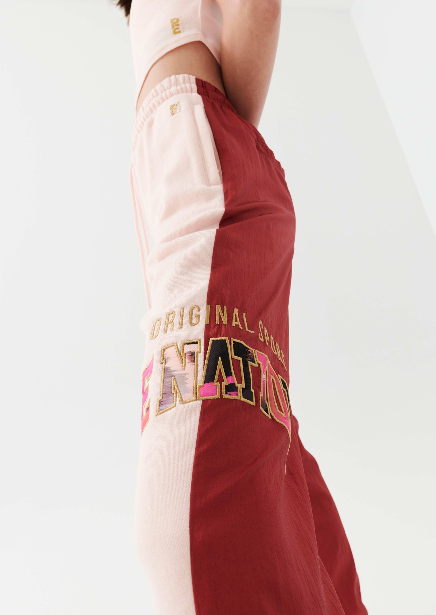 DOUBLE UNDER TRACKPANT IN CANDY