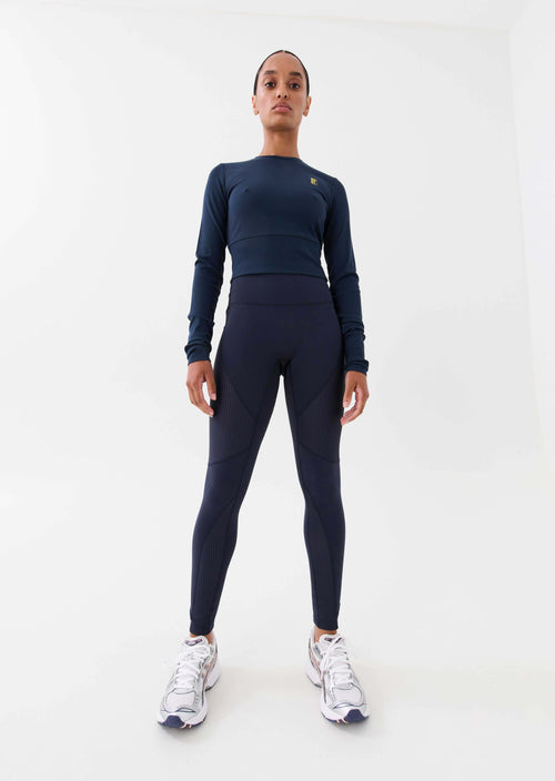 FREE PLAY LEGGING IN MIDNIGHT NAVY