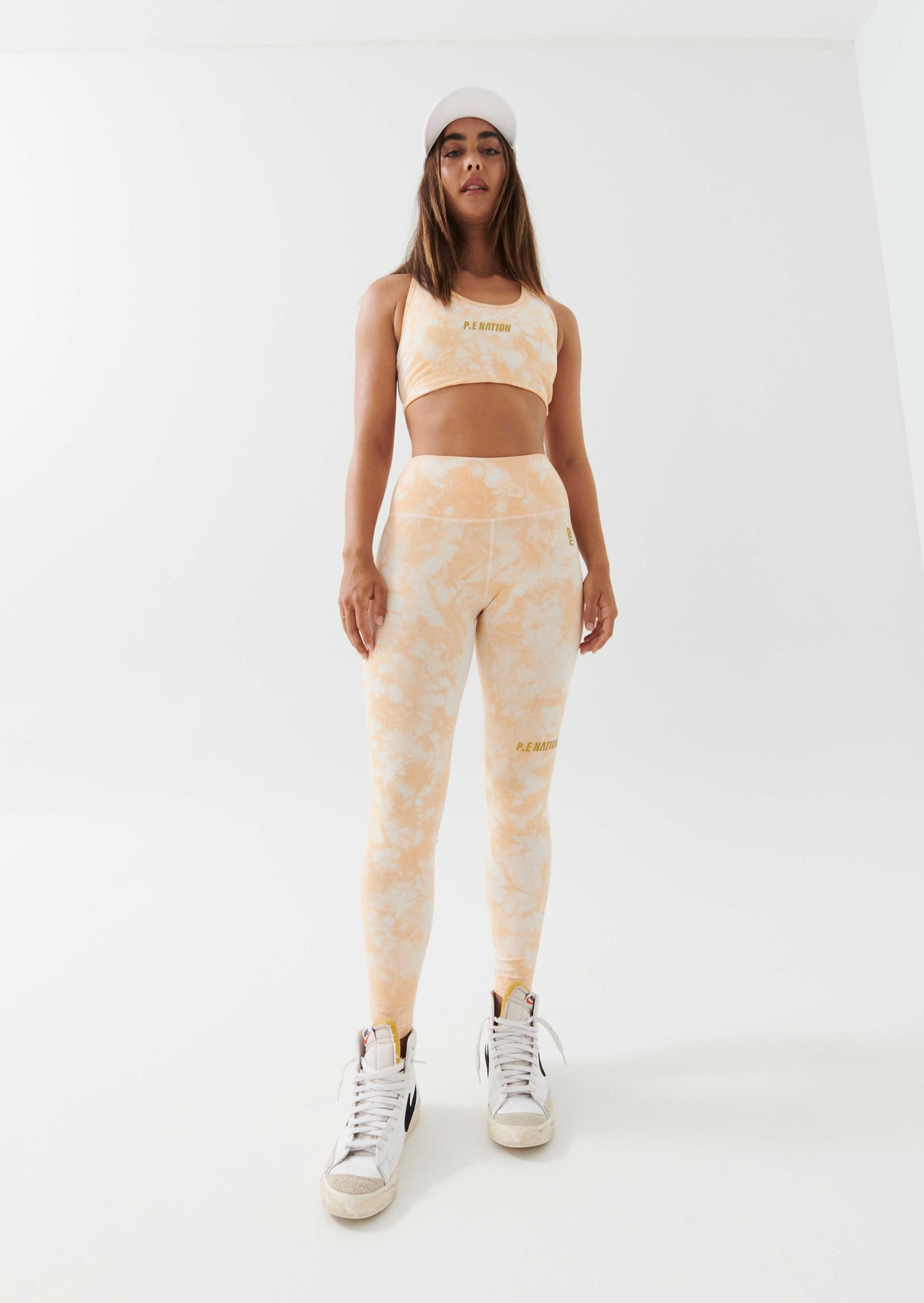 REACT SPORTS BRA IN GOLDEN SAND