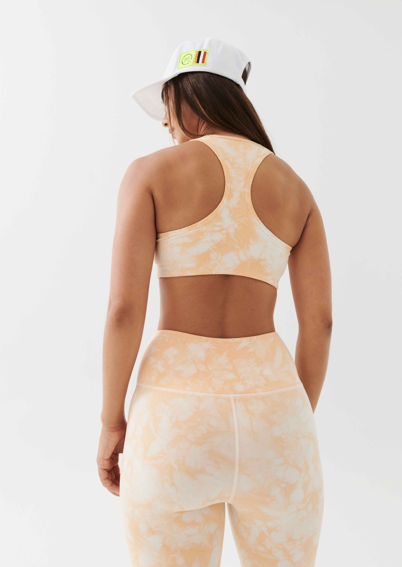 REACT SPORTS BRA IN GOLDEN SAND