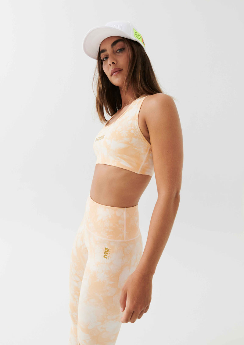 REACT SPORTS BRA IN GOLDEN SAND